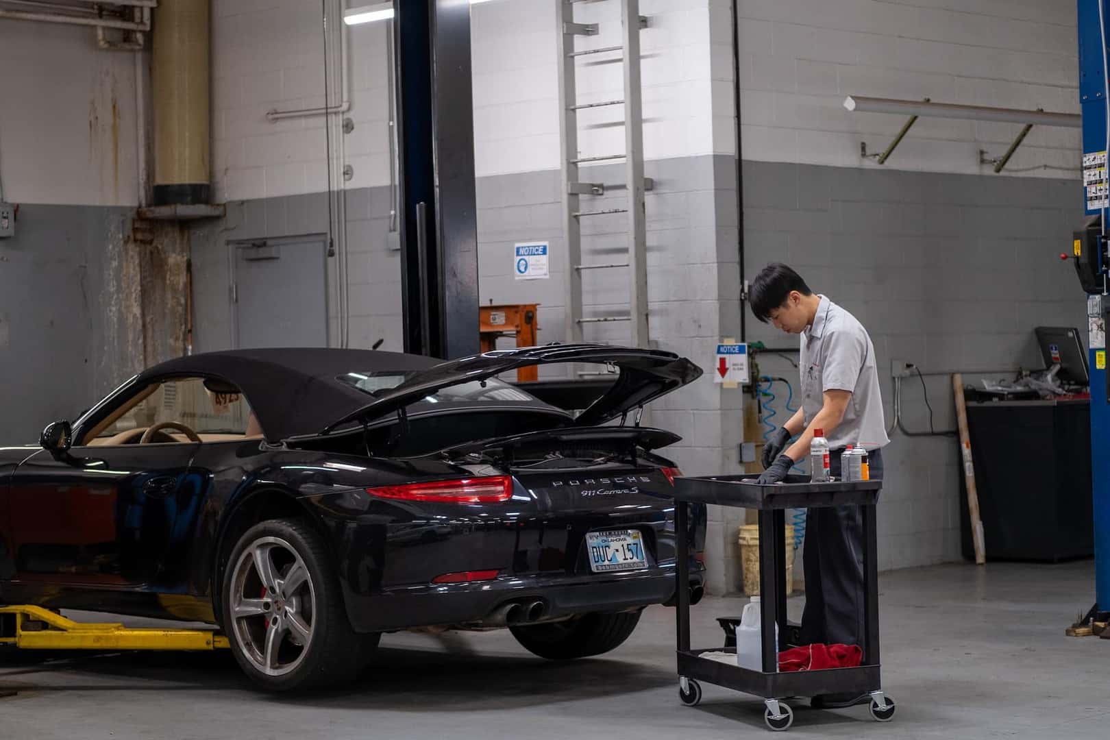 Porsche 911 Carrera being repaired in service center