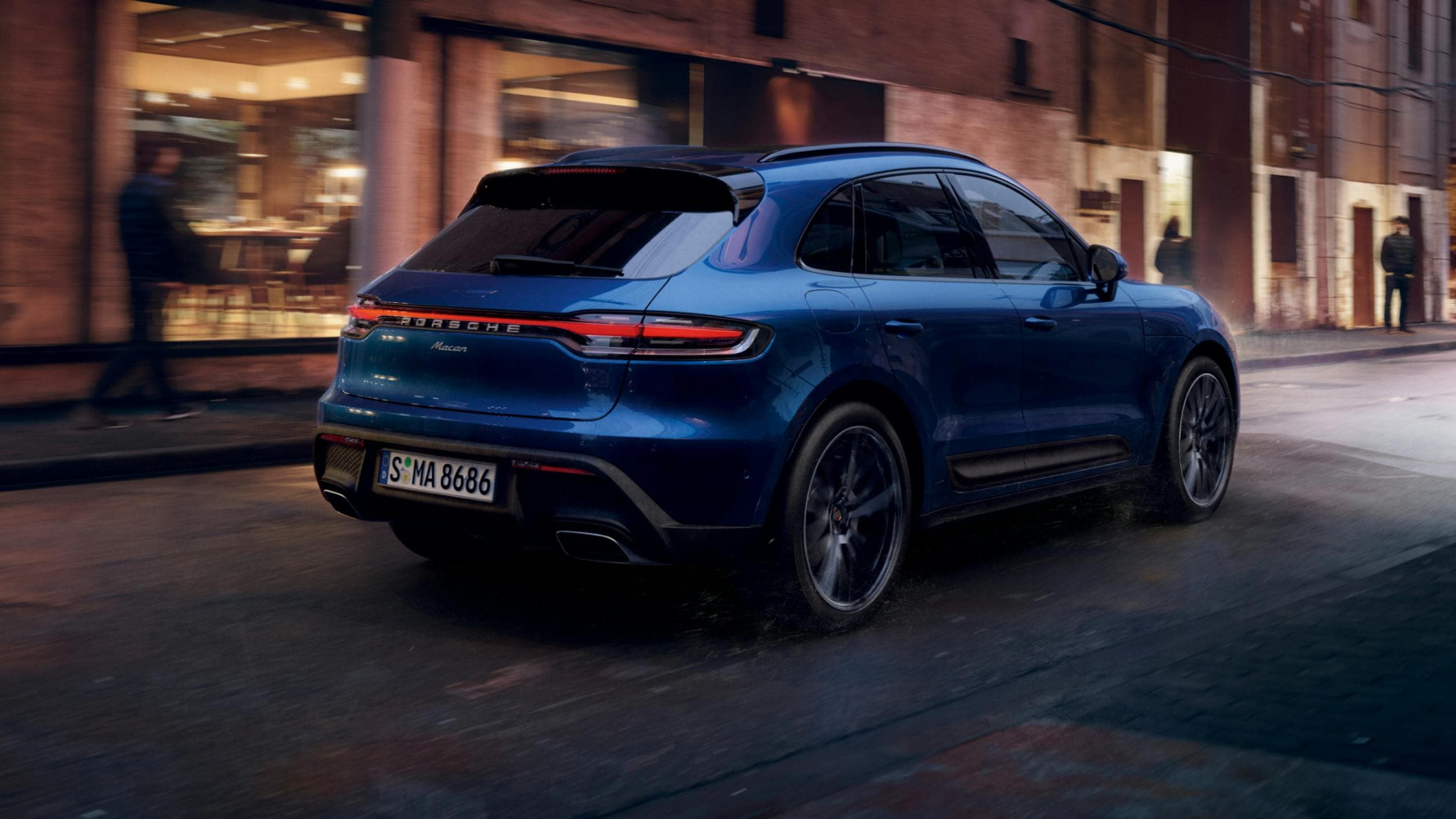 2025 porsche macan driver side exterior profile view